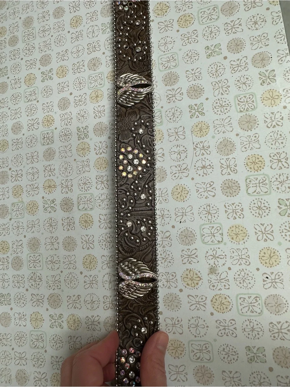 Women's Brown Embossed Leather Belt with Crystal Wing Buckle